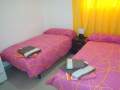 habitacion con 2 camas